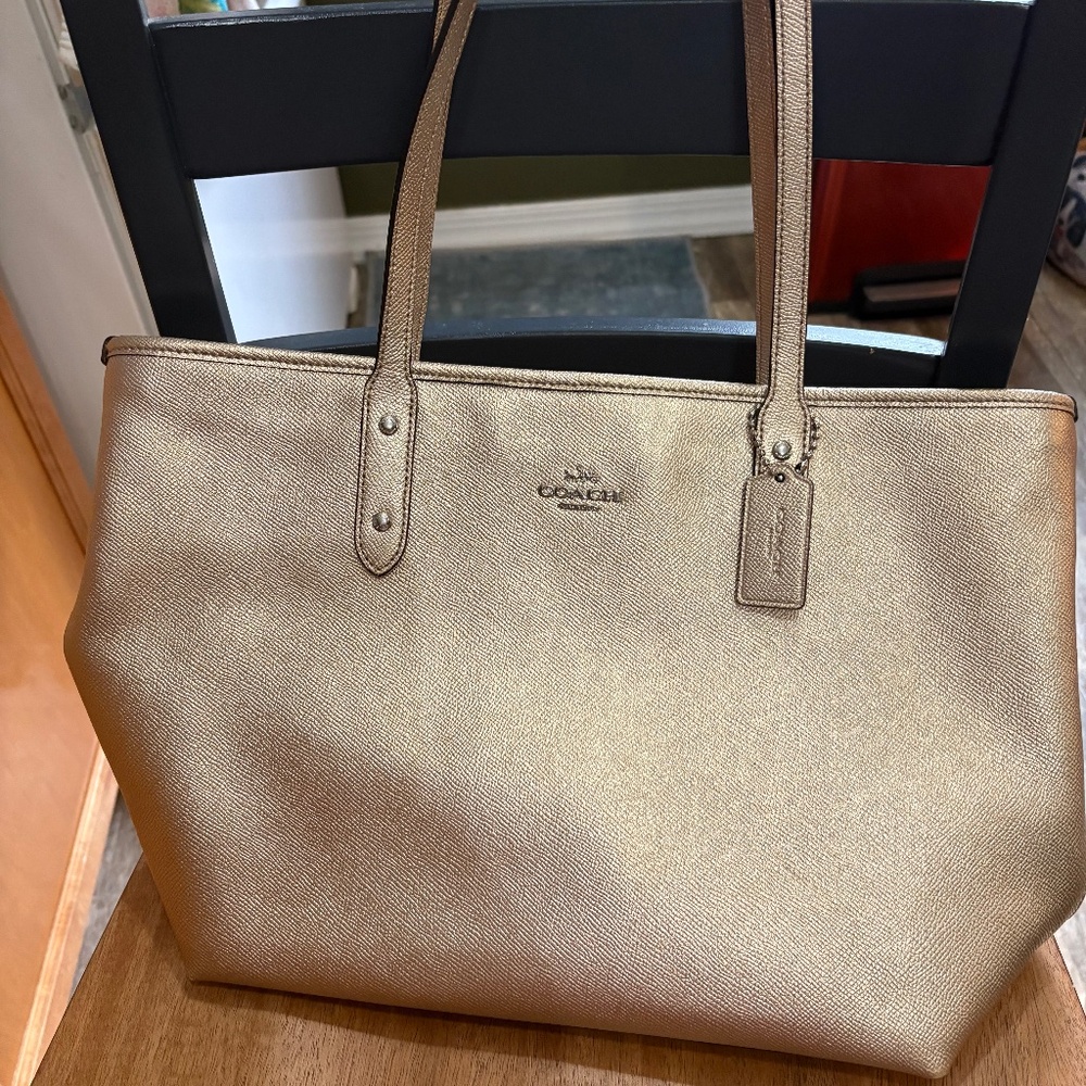 Gold coach handbag